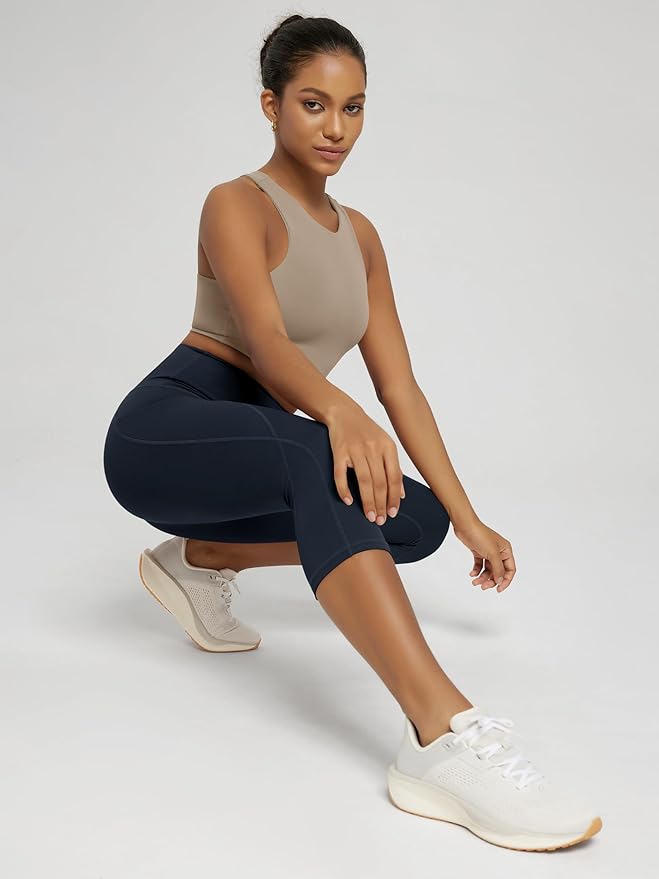 ODODOS Women's High Waisted Yoga Capris with Pockets, Tummy Control Non See Through Workout Athletic Running Capri Leggings
