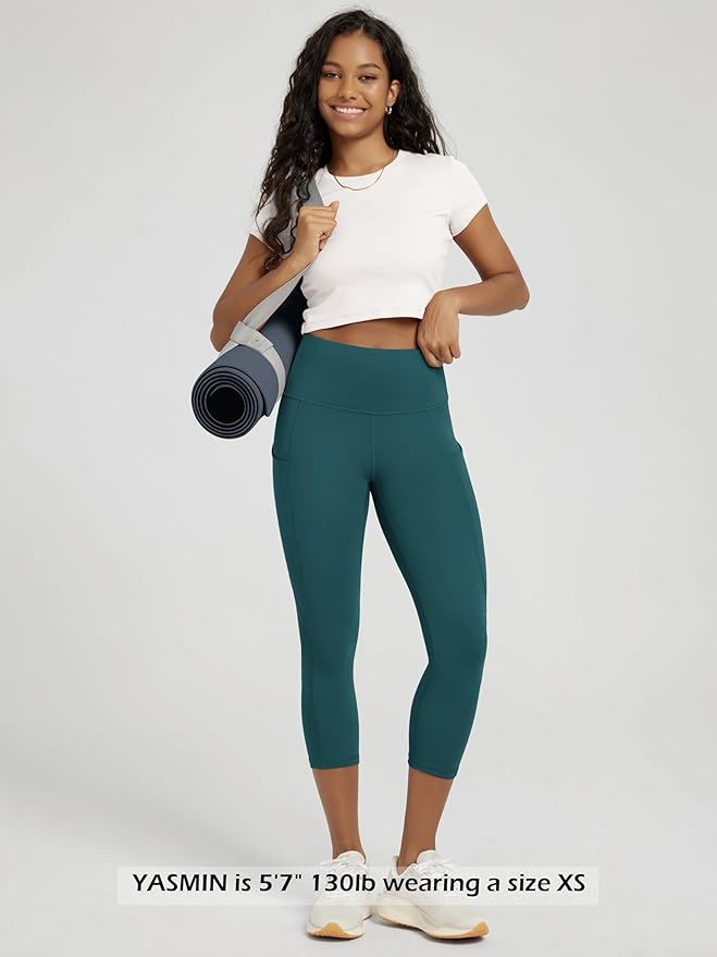 ODODOS Women's High Waisted Yoga Capris with Pockets, Tummy Control Non See Through Workout Athletic Running Capri Leggings