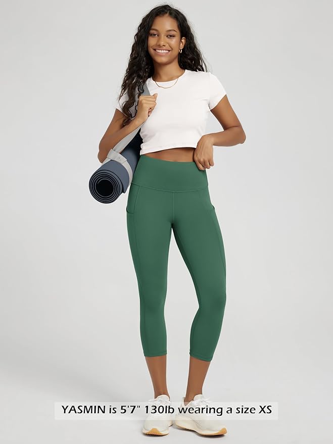 ODODOS Women's High Waisted Yoga Capris with Pockets, Tummy Control Non See Through Workout Athletic Running Capri Leggings