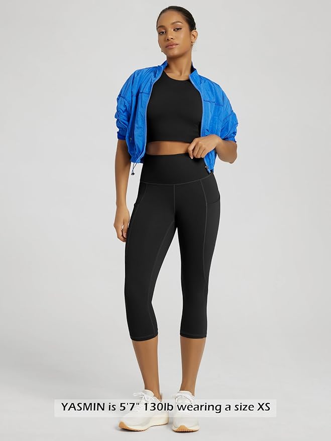 ODODOS Women's High Waisted Yoga Capris with Pockets, Tummy Control Non See Through Workout Athletic Running Capri Leggings