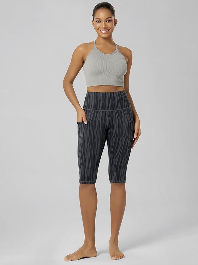 ODODOS Women's High Waisted Yoga Capris with Pockets, Tummy Control Non See Through Workout Athletic Running Capri Leggings