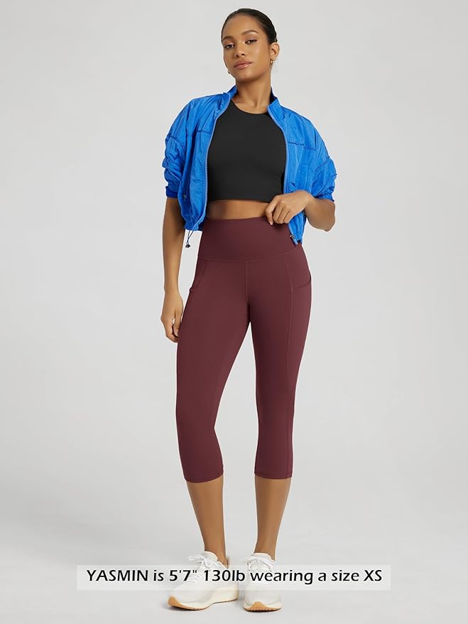 ODODOS Women's High Waisted Yoga Capris with Pockets, Tummy Control Non See Through Workout Athletic Running Capri Leggings