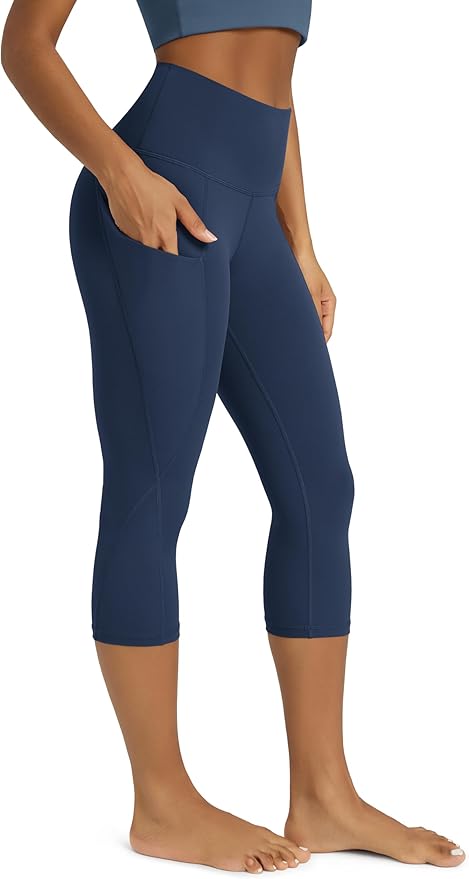 ODODOS Women's High Waisted Yoga Capris with Pockets, Tummy Control Non See Through Workout Athletic Running Capri Leggings