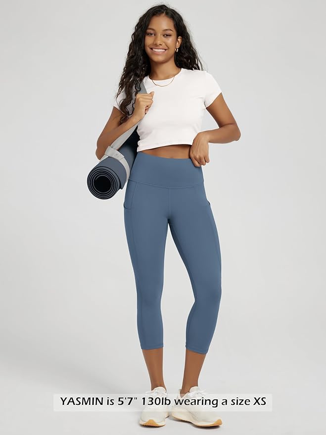 ODODOS Women's High Waisted Yoga Capris with Pockets, Tummy Control Non See Through Workout Athletic Running Capri Leggings