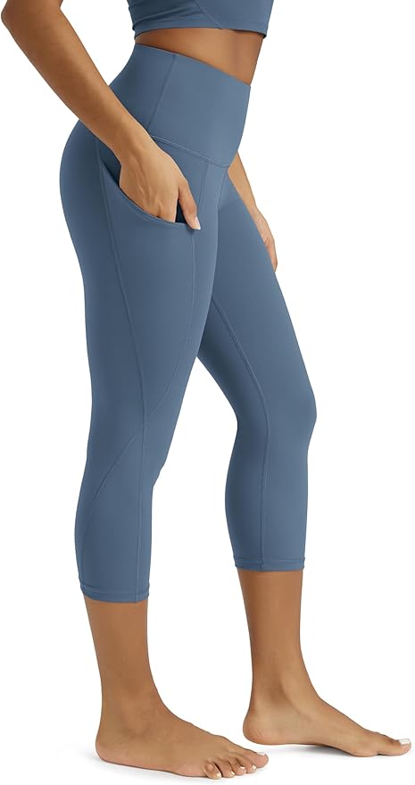 ODODOS Women's High Waisted Yoga Capris with Pockets, Tummy Control Non See Through Workout Athletic Running Capri Leggings
