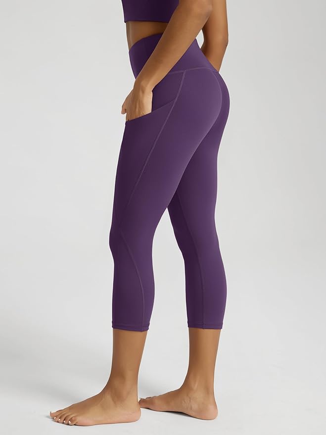 ODODOS Women's High Waisted Yoga Capris with Pockets, Tummy Control Non See Through Workout Athletic Running Capri Leggings