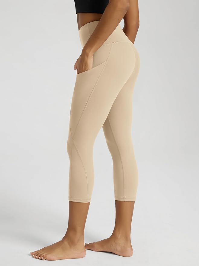 ODODOS Women's High Waisted Yoga Capris with Pockets, Tummy Control Non See Through Workout Athletic Running Capri Leggings