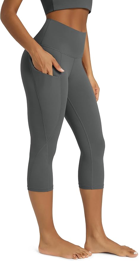 ODODOS Women's High Waisted Yoga Capris with Pockets, Tummy Control Non See Through Workout Athletic Running Capri Leggings