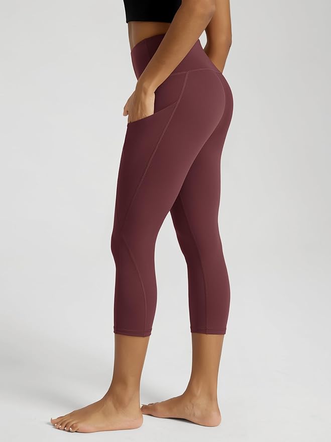 ODODOS Women's High Waisted Yoga Capris with Pockets, Tummy Control Non See Through Workout Athletic Running Capri Leggings