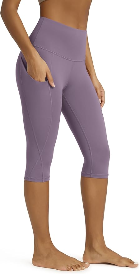 ODODOS Women's High Waisted Yoga Capris with Pockets, Tummy Control Non See Through Workout Athletic Running Capri Leggings