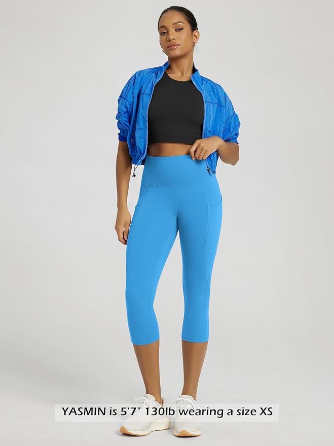 ODODOS Women's High Waisted Yoga Capris with Pockets, Tummy Control Non See Through Workout Athletic Running Capri Leggings