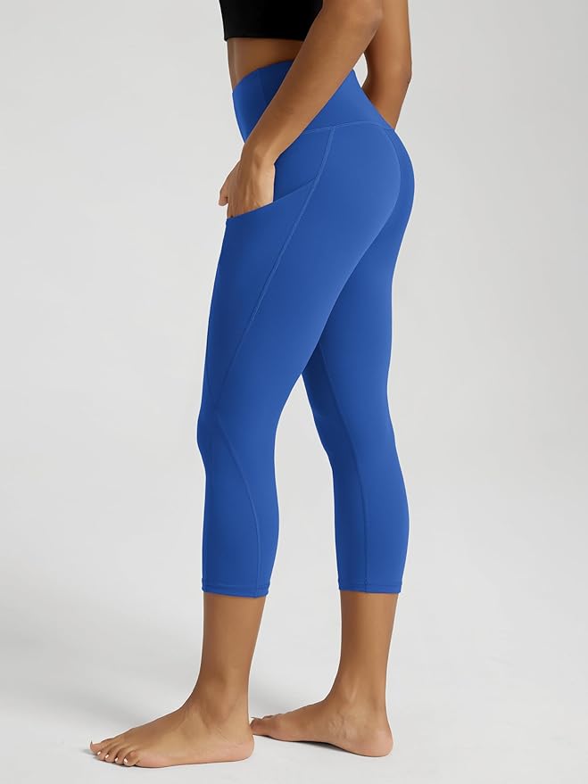 ODODOS Women's High Waisted Yoga Capris with Pockets, Tummy Control Non See Through Workout Athletic Running Capri Leggings