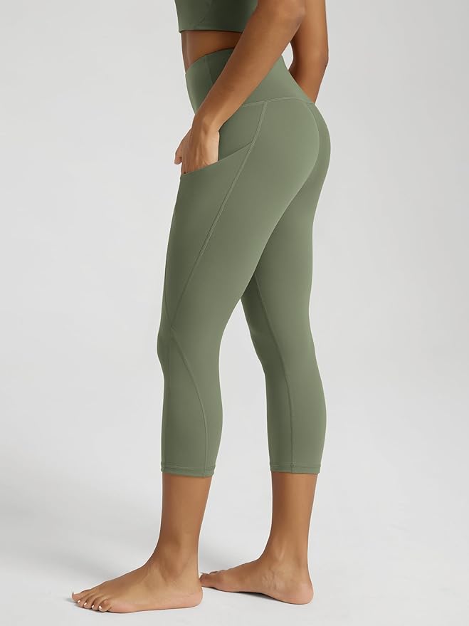ODODOS Women's High Waisted Yoga Capris with Pockets, Tummy Control Non See Through Workout Athletic Running Capri Leggings