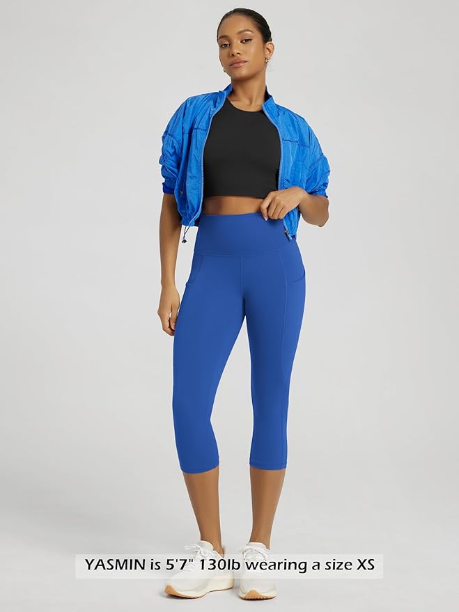 ODODOS Women's High Waisted Yoga Capris with Pockets, Tummy Control Non See Through Workout Athletic Running Capri Leggings
