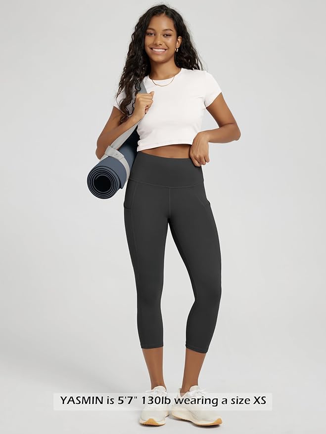 ODODOS Women's High Waisted Yoga Capris with Pockets, Tummy Control Non See Through Workout Athletic Running Capri Leggings