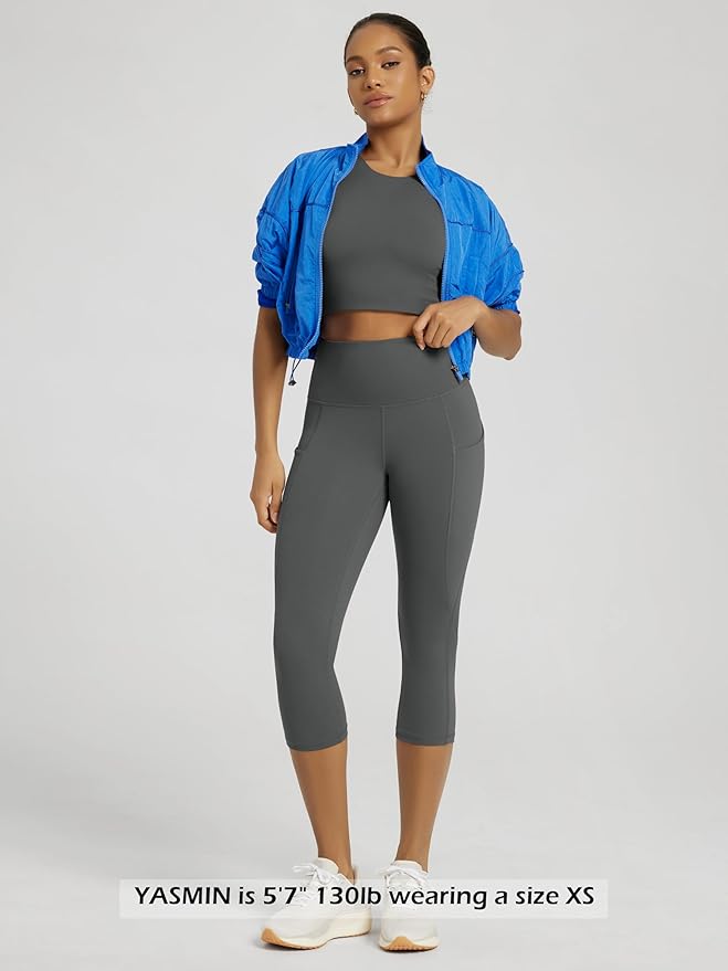 ODODOS Women's High Waisted Yoga Capris with Pockets, Tummy Control Non See Through Workout Athletic Running Capri Leggings