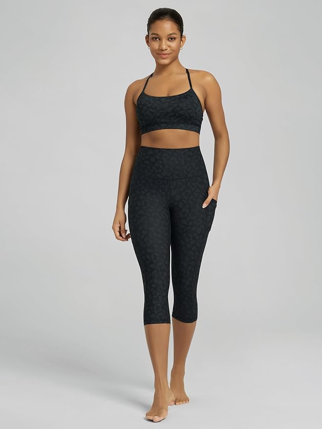 ODODOS Women's High Waisted Yoga Capris with Pockets, Tummy Control Non See Through Workout Athletic Running Capri Leggings