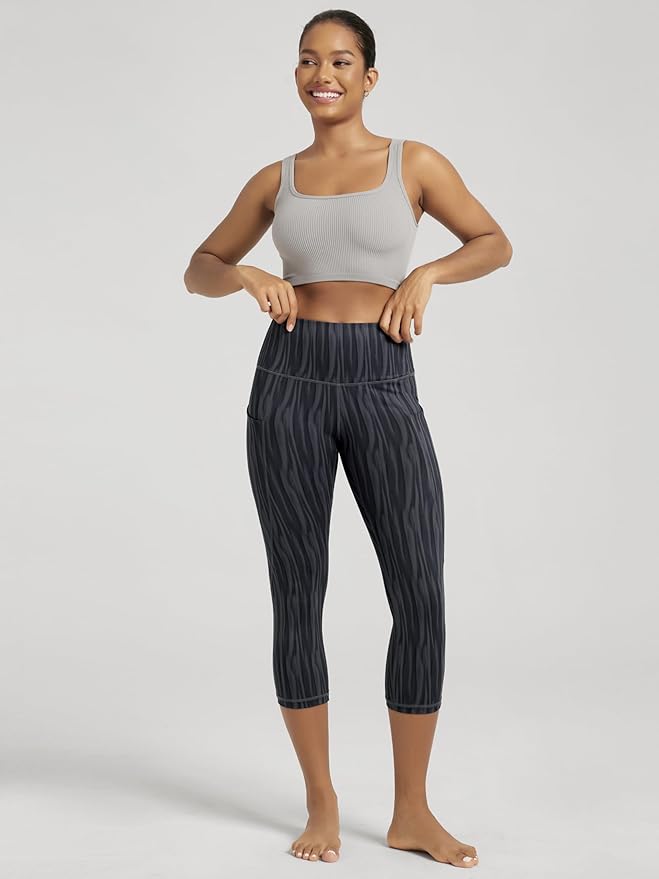 ODODOS Women's High Waisted Yoga Capris with Pockets, Tummy Control Non See Through Workout Athletic Running Capri Leggings