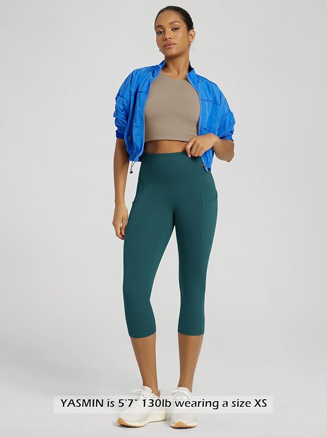 ODODOS Women's High Waisted Yoga Capris with Pockets, Tummy Control Non See Through Workout Athletic Running Capri Leggings