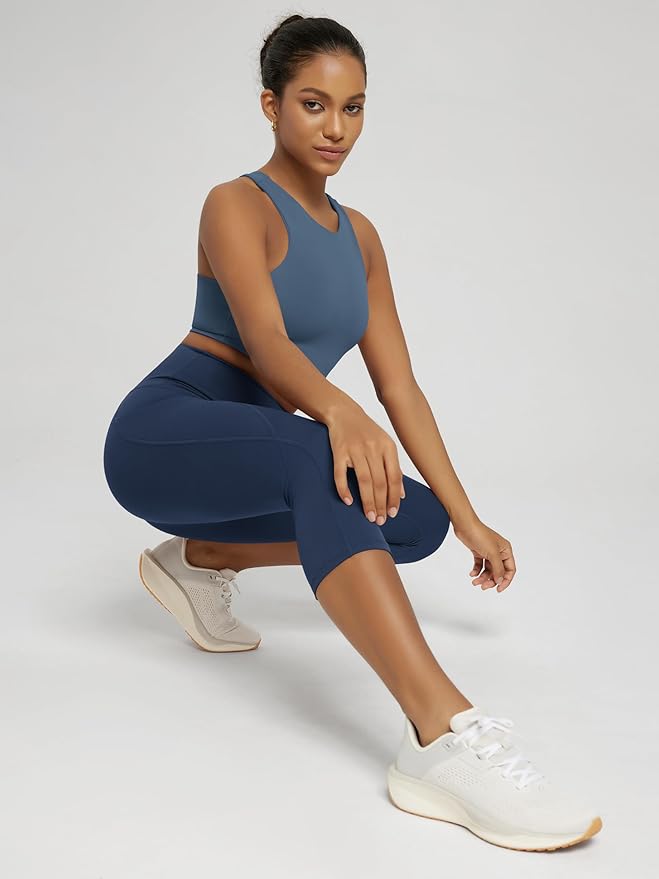 ODODOS Women's High Waisted Yoga Capris with Pockets, Tummy Control Non See Through Workout Athletic Running Capri Leggings