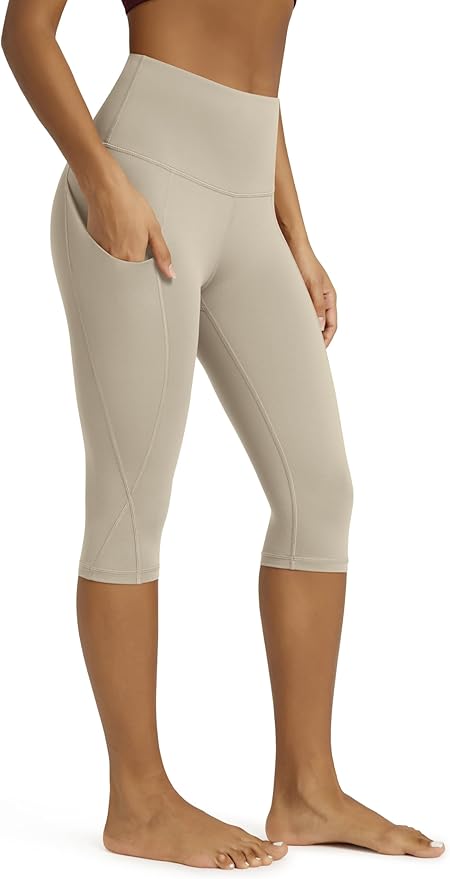 ODODOS Women's High Waisted Yoga Capris with Pockets, Tummy Control Non See Through Workout Athletic Running Capri Leggings