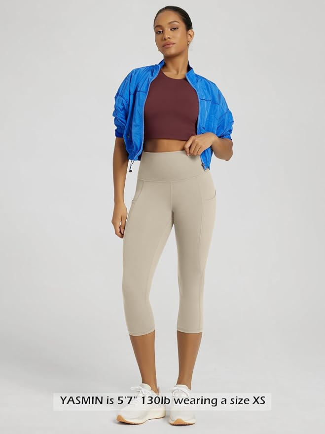 ODODOS Women's High Waisted Yoga Capris with Pockets, Tummy Control Non See Through Workout Athletic Running Capri Leggings