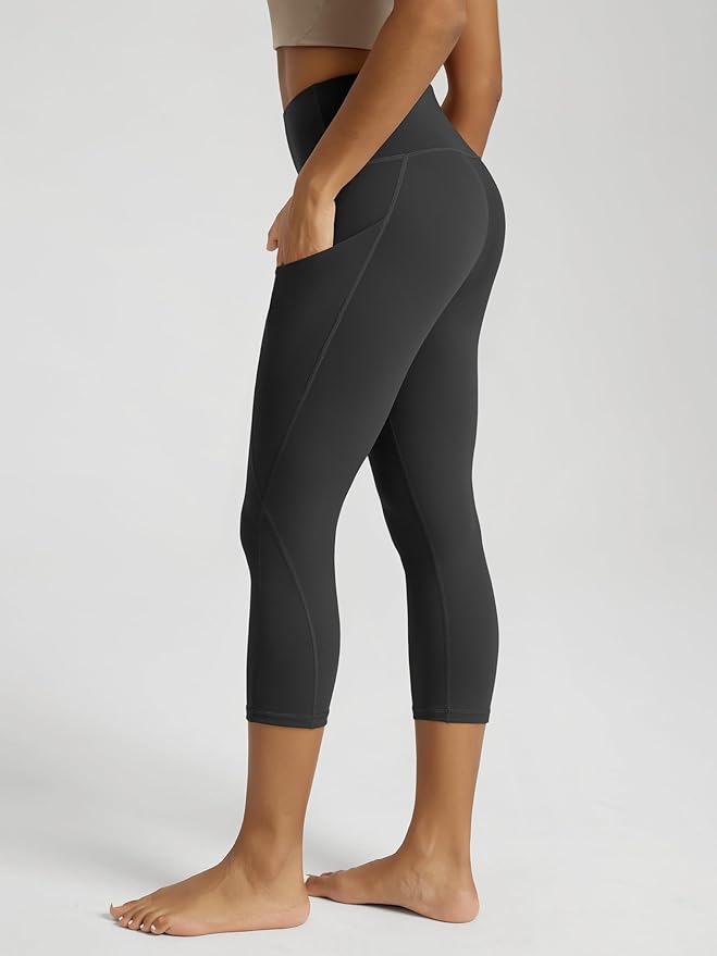 ODODOS Women's High Waisted Yoga Capris with Pockets, Tummy Control Non See Through Workout Athletic Running Capri Leggings
