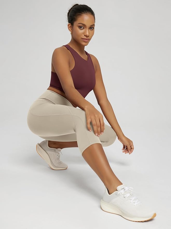 ODODOS Women's High Waisted Yoga Capris with Pockets, Tummy Control Non See Through Workout Athletic Running Capri Leggings