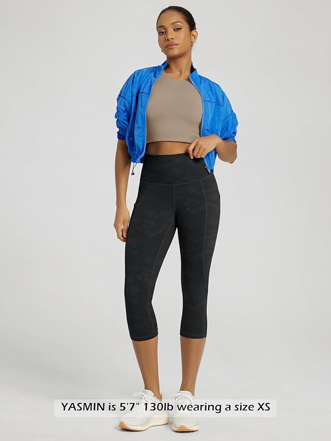 ODODOS Women's High Waisted Yoga Capris with Pockets, Tummy Control Non See Through Workout Athletic Running Capri Leggings