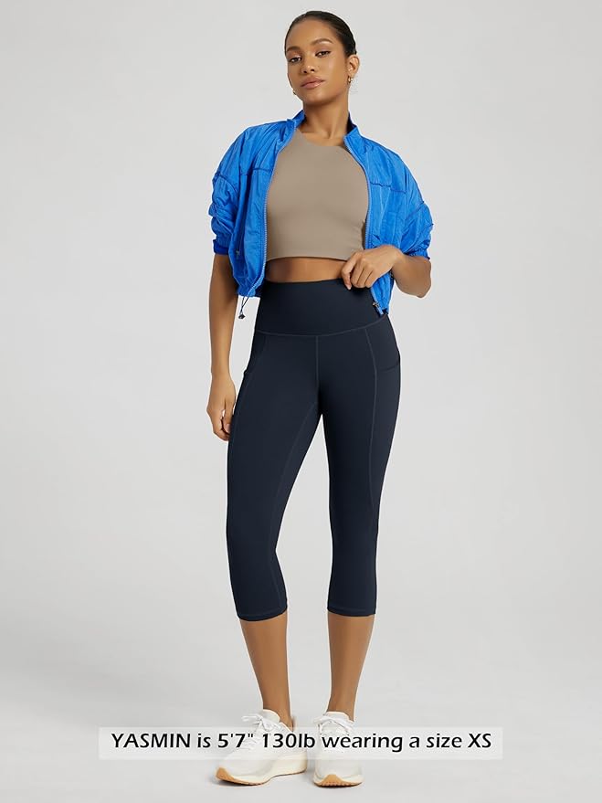 ODODOS Women's High Waisted Yoga Capris with Pockets, Tummy Control Non See Through Workout Athletic Running Capri Leggings