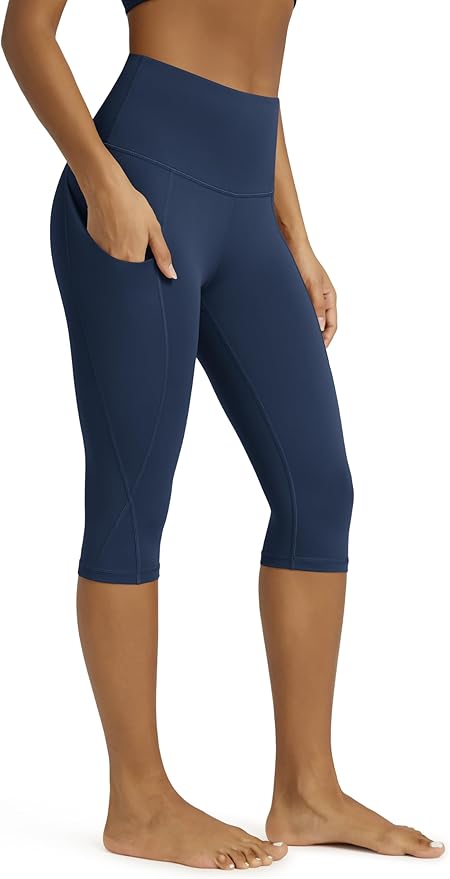 ODODOS Women's High Waisted Yoga Capris with Pockets, Tummy Control Non See Through Workout Athletic Running Capri Leggings