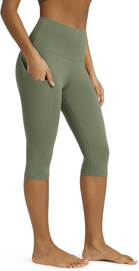 ODODOS Women's High Waisted Yoga Capris with Pockets, Tummy Control Non See Through Workout Athletic Running Capri Leggings