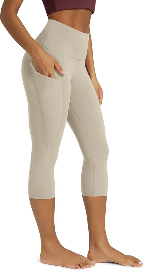 ODODOS Women's High Waisted Yoga Capris with Pockets, Tummy Control Non See Through Workout Athletic Running Capri Leggings