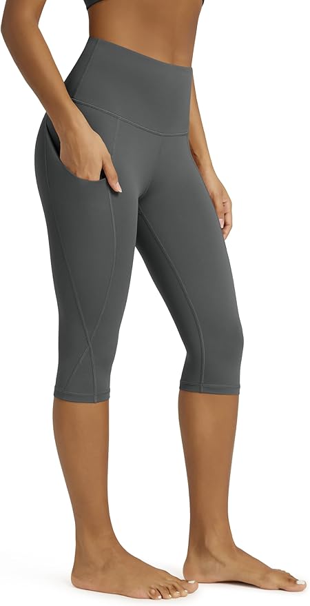 ODODOS Women's High Waisted Yoga Capris with Pockets, Tummy Control Non See Through Workout Athletic Running Capri Leggings
