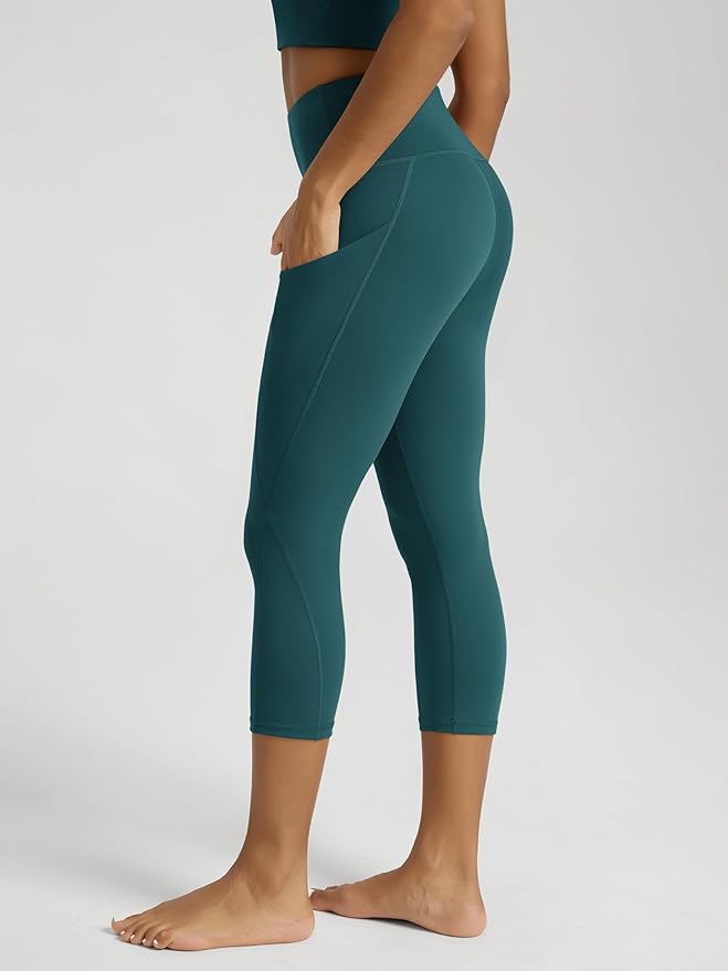 ODODOS Women's High Waisted Yoga Capris with Pockets, Tummy Control Non See Through Workout Athletic Running Capri Leggings