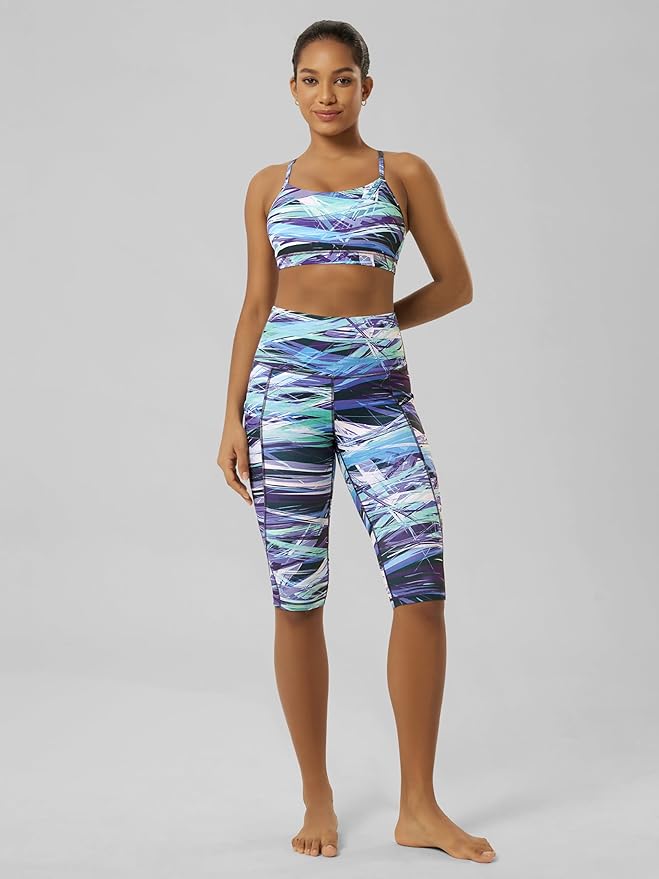 ODODOS Women's High Waisted Yoga Capris with Pockets, Tummy Control Non See Through Workout Athletic Running Capri Leggings