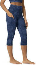 ODODOS Women's High Waisted Yoga Capris with Pockets, Tummy Control Non See Through Workout Athletic Running Capri Leggings