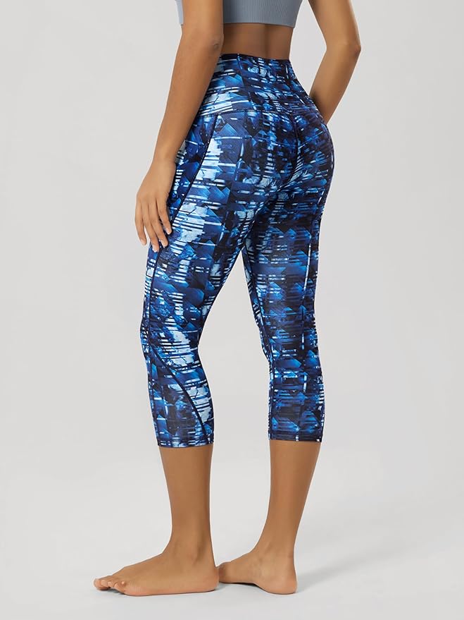 ODODOS Women's High Waisted Yoga Capris with Pockets, Tummy Control Non See Through Workout Athletic Running Capri Leggings