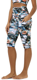ODODOS Women's High Waisted Yoga Capris with Pockets, Tummy Control Non See Through Workout Athletic Running Capri Leggings