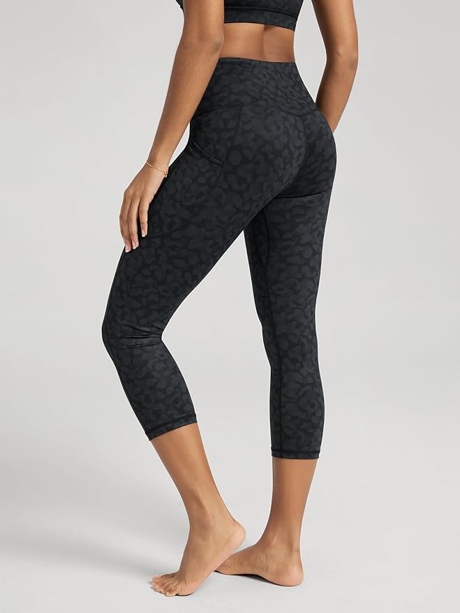 ODODOS Women's High Waisted Yoga Capris with Pockets, Tummy Control Non See Through Workout Athletic Running Capri Leggings