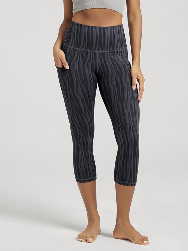ODODOS Women's High Waisted Yoga Capris with Pockets, Tummy Control Non See Through Workout Athletic Running Capri Leggings