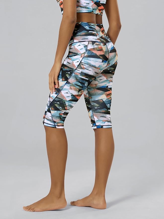 ODODOS Women's High Waisted Yoga Capris with Pockets, Tummy Control Non See Through Workout Athletic Running Capri Leggings