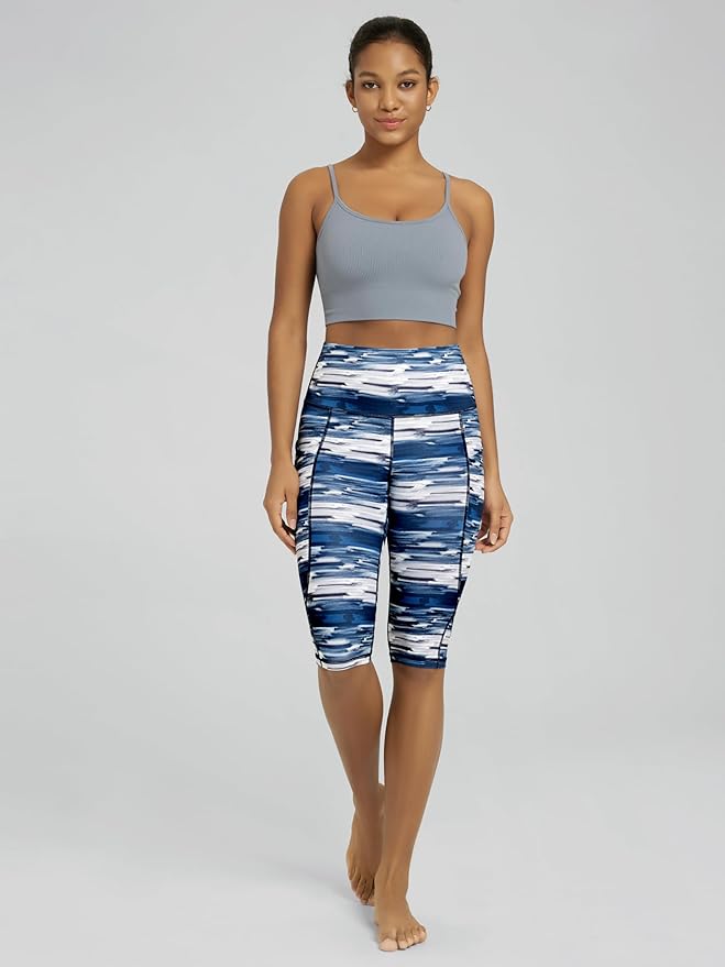 ODODOS Women's High Waisted Yoga Capris with Pockets, Tummy Control Non See Through Workout Athletic Running Capri Leggings