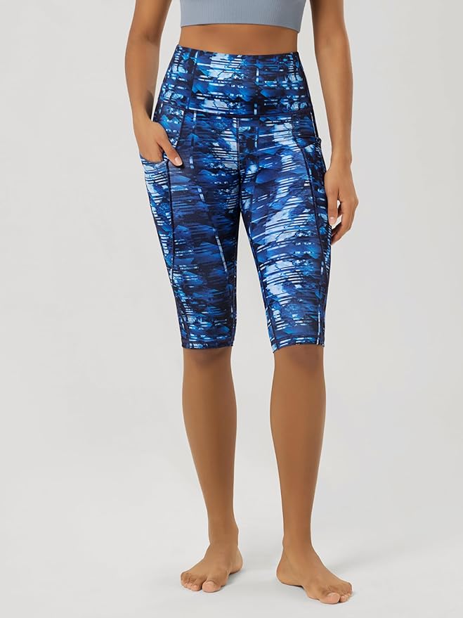 ODODOS Women's High Waisted Yoga Capris with Pockets, Tummy Control Non See Through Workout Athletic Running Capri Leggings