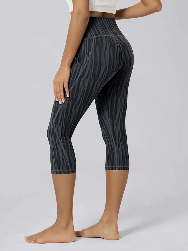 ODODOS Women's High Waisted Yoga Capris with Pockets, Tummy Control Non See Through Workout Athletic Running Capri Leggings