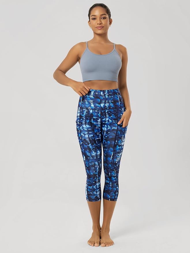 ODODOS Women's High Waisted Yoga Capris with Pockets, Tummy Control Non See Through Workout Athletic Running Capri Leggings