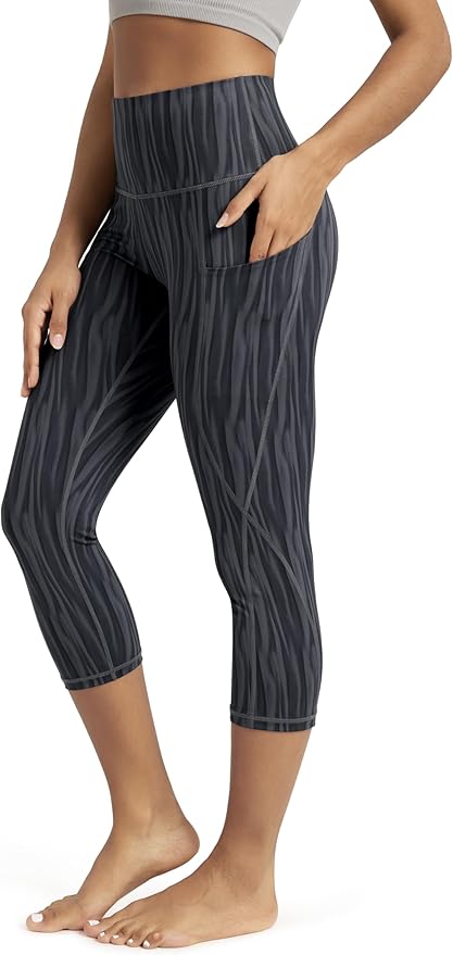 ODODOS Women's High Waisted Yoga Capris with Pockets, Tummy Control Non See Through Workout Athletic Running Capri Leggings