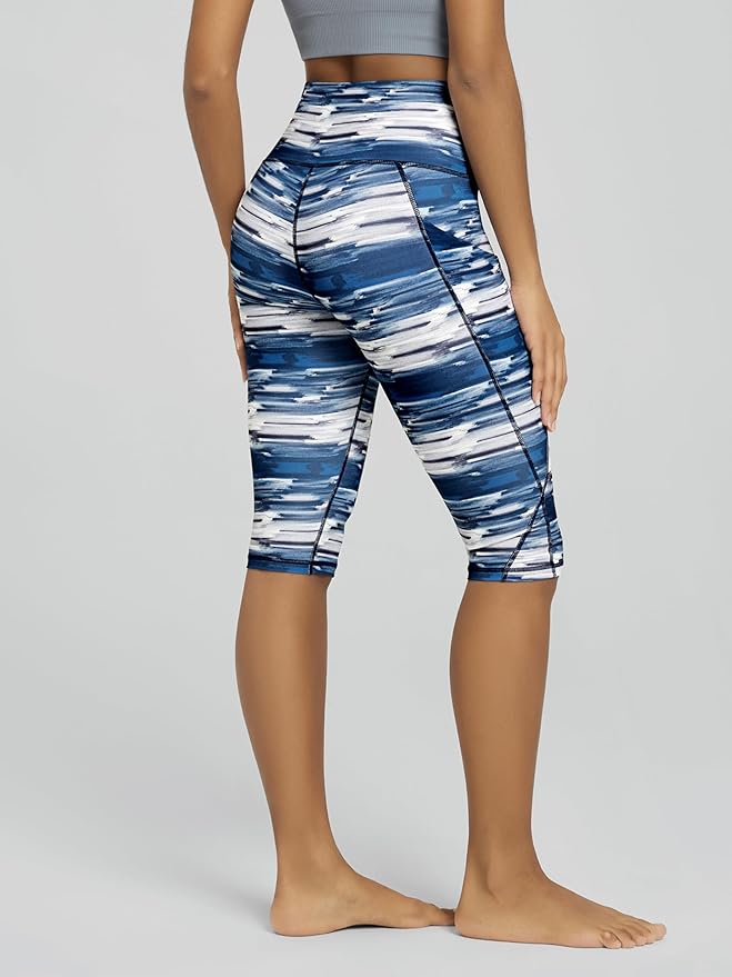 ODODOS Women's High Waisted Yoga Capris with Pockets, Tummy Control Non See Through Workout Athletic Running Capri Leggings