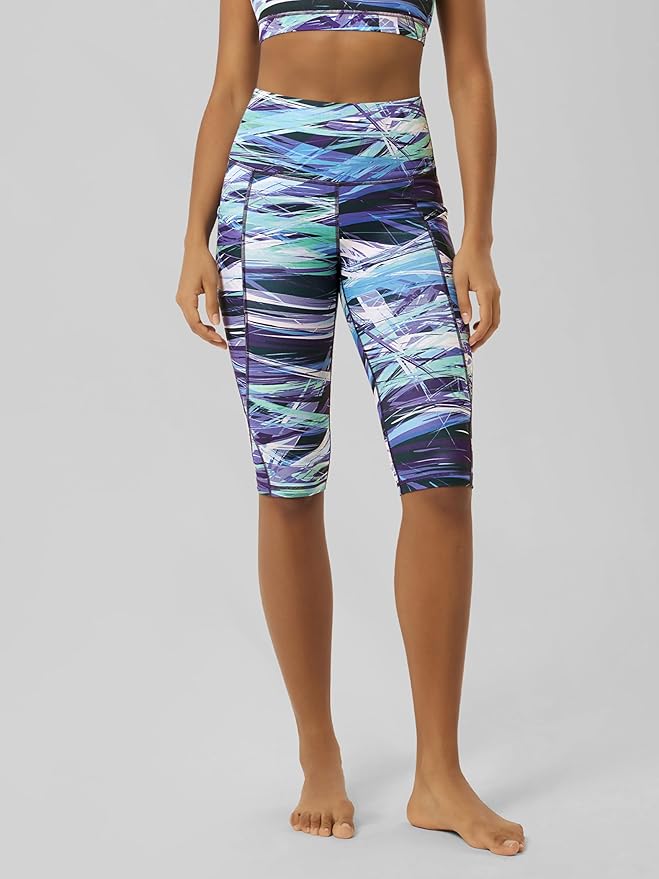 ODODOS Women's High Waisted Yoga Capris with Pockets, Tummy Control Non See Through Workout Athletic Running Capri Leggings