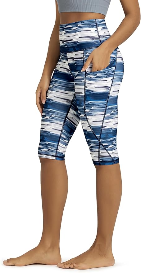 ODODOS Women's High Waisted Yoga Capris with Pockets, Tummy Control Non See Through Workout Athletic Running Capri Leggings